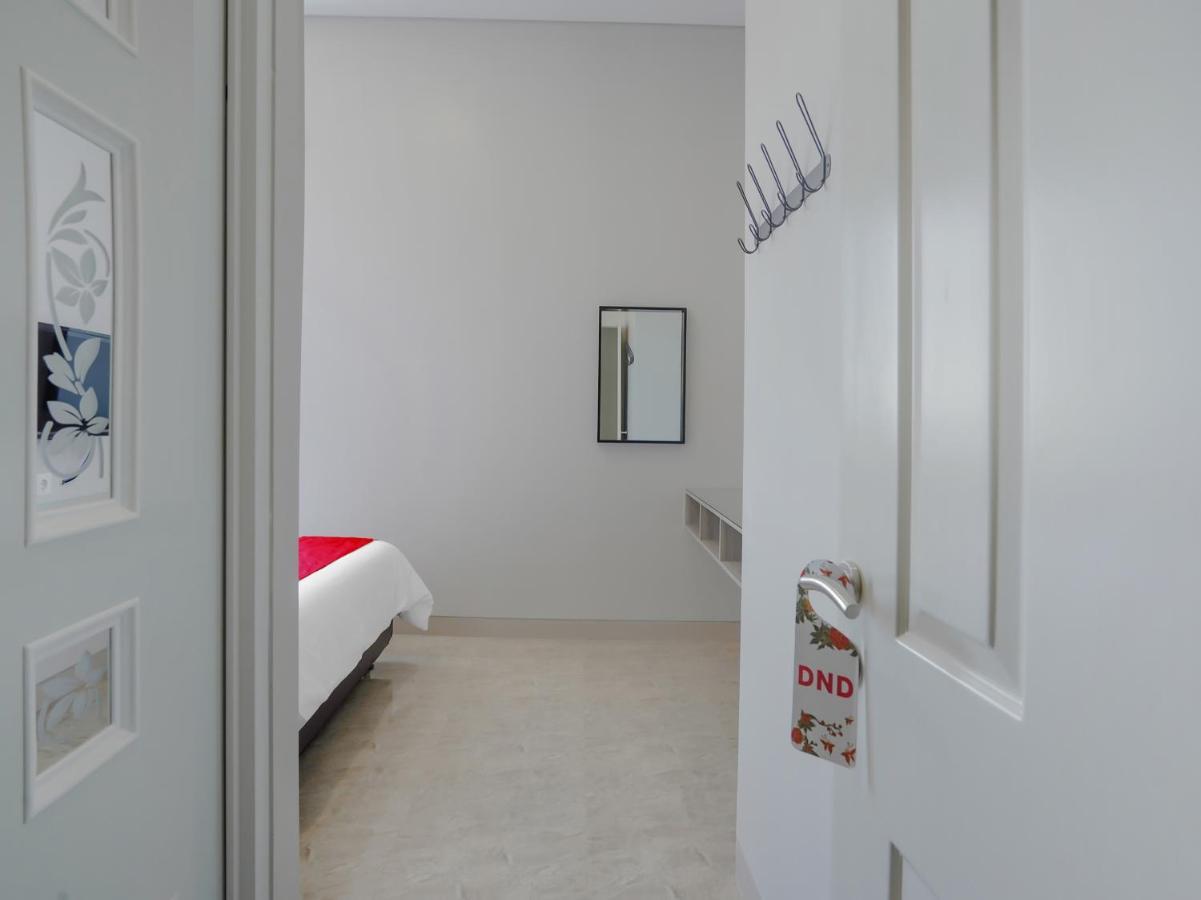 Super Oyo Capital O 90336 Olive Guest House Surabaya Bagian luar foto